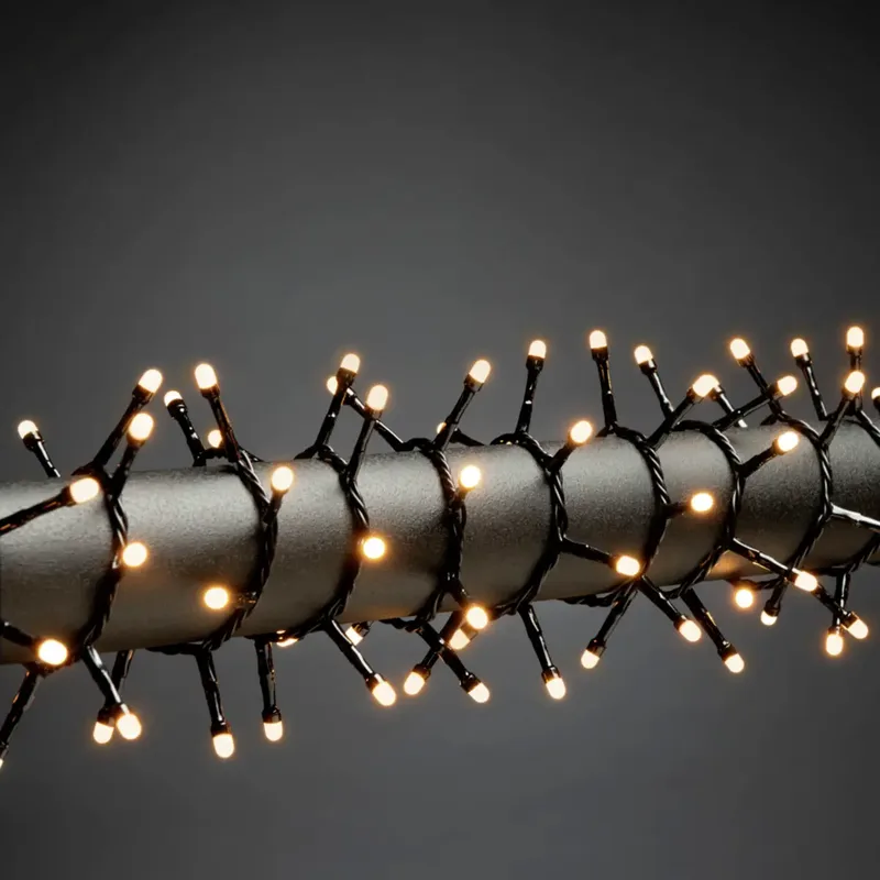 Konstsmide 3871-830 Lichtketting Buiten Energielabel: E (A - G) werkt op het lichtnet Aantal lampen 1500 LED Barnsteen Verlichte lengte: 32.98 m Frosted från Konstsmide – produktbild