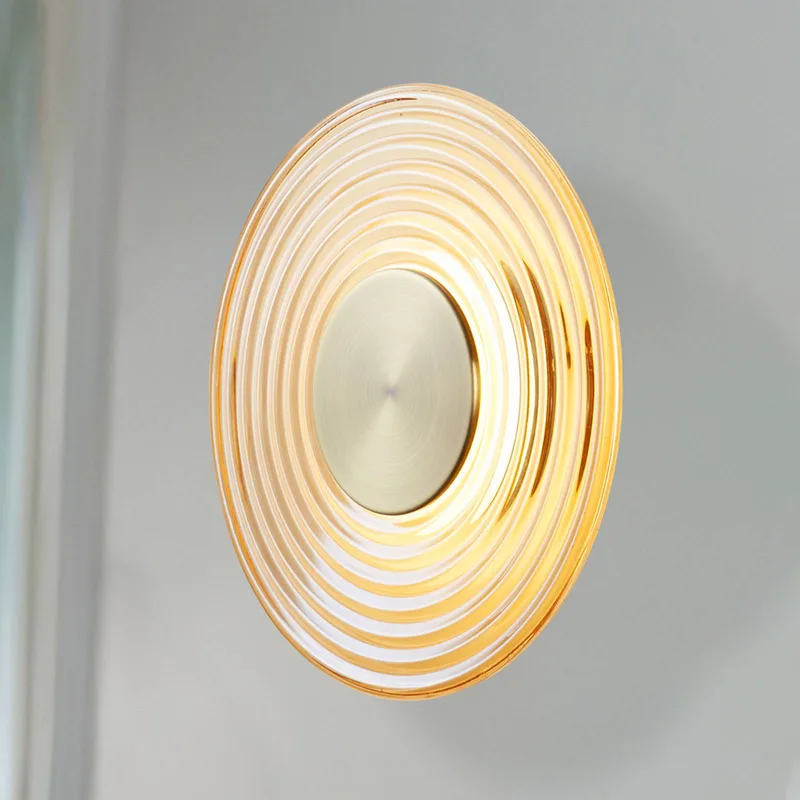 LED wandlamp Cleo, amber-/messingkleurig, Ø 30 cm, glas de Searchlight en Amber, Antiek messing – photo produit
