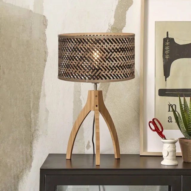 Java table lamp with three legs, natural and black
