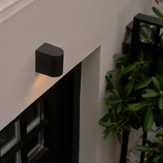 Liten dimbar utomhusvägglampa Dion. från Nordlux i Svart – produktbild 1 av 3